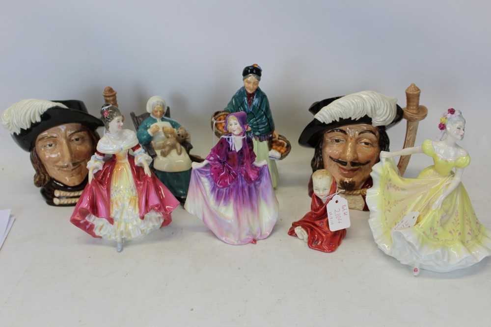 Lot 2104 - Six Royal Doulton figures to include Southern Belle HN2229, Ninette HN2379, This Little Pig HN1793, Sweet Anne HN1496, Nanny HN2221, The Orange Lady HN1953, together with two Royal Doulton Muskatee...