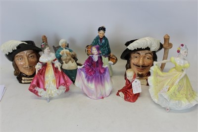 Lot 2104 - Six Royal Doulton figures to include Southern Belle HN2229, Ninette HN2379, This Little Pig HN1793, Sweet Anne HN1496, Nanny HN2221, The Orange Lady HN1953, together with two Royal Doulton Muskatee...