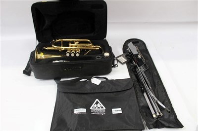 Lot 3684 - Sonata brass cornet in case, together with a folding music stand and bag