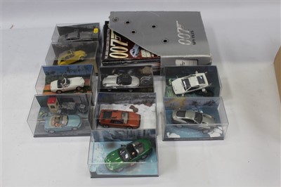 Lot 2878 - Collection of James Bond model cars and magazines