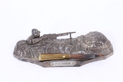 Lot 550 - Unusual French Novelty Diecast inkwell in the form of a machine gunner at his post, with plaque- “Sir De Strasbourg” 18cm in length