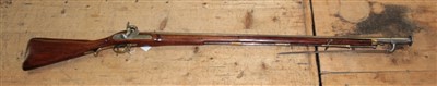 Lot 907 - 19th century East India Company Brown Bess - type percussion musket with Lion crest mark to lock ,walnut stock with brass furniture and original socket bayonet - 139cm overall