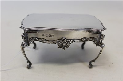 Lot 3548 - Edwardian silver jewellery box in the form of a French style side table with scroll legs, hinged cover and velvet interior. (London 1905)hinged cover. (Lon...