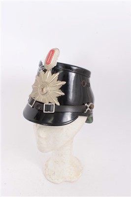 Lot 575 - Post War German Berlin Police Shako, with leather head band by Friedrich Becker & Co. K.G. Berlin