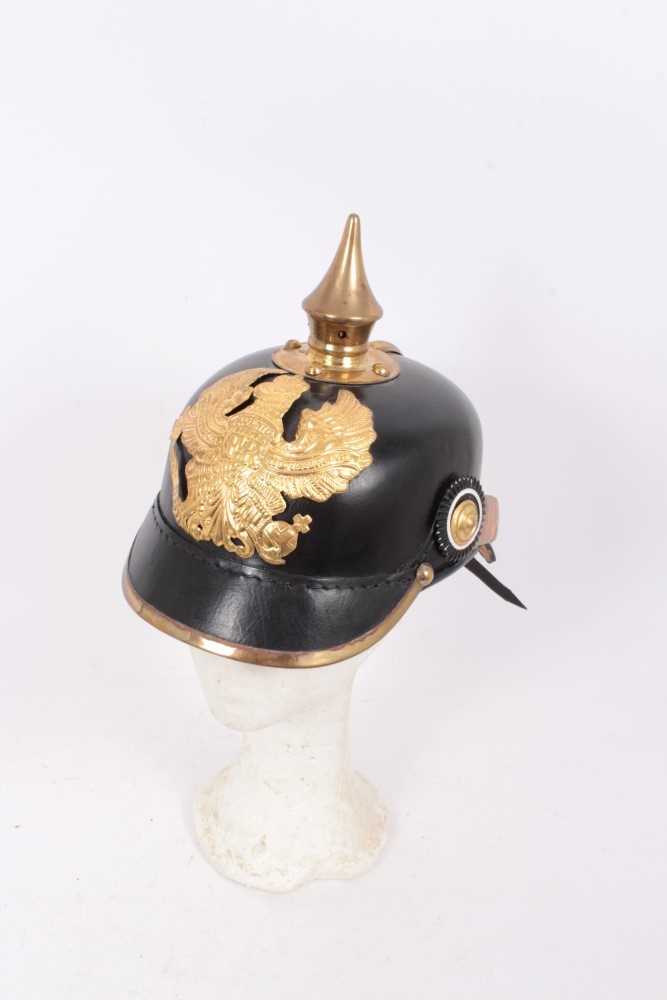 Lot 578 - Reproduction Imperial German Picklehaube helmet of leather construction with gilt eagle badge