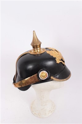 Lot 578 - Reproduction Imperial German Picklehaube helmet of leather construction with gilt eagle badge