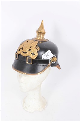 Lot 579 - Reproduction Imperial German Picklehaube helmet of leather construction with gilt eagle badge