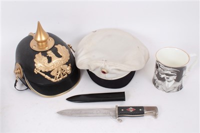 Lot 580 - Group of mixed Militaria to include a replica Picklehaube, German Naval Cap, flag and Hitler related items