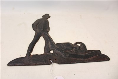 Lot 3549 - Interesting early 19th century cast iron plaque depicting a Ransomes Budding's Patent grass-cutting machine, together with a Ransomes 1789-1989 Bicentennial Celebration book that has a copy of the...