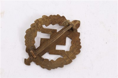 Lot 599 - Nazi S.A. sports badge, in gilt, numbered 264587 on reverse