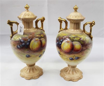 Lot 2149 - Pair of Crown Devon vases and covers with hand painted fruit decoration