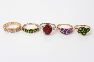 Lot 3296 - Five gold (9ct) gem set dress rings