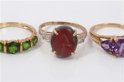 Lot 3296 - Five gold (9ct) gem set dress rings