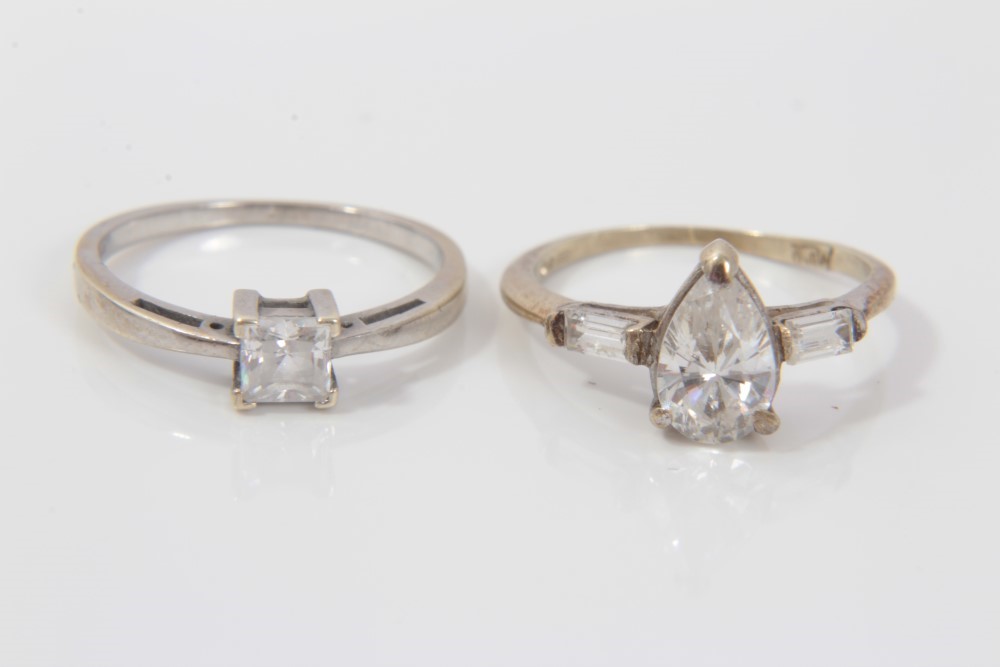 Lot 3297 - Two white gold (9ct) white stone rings