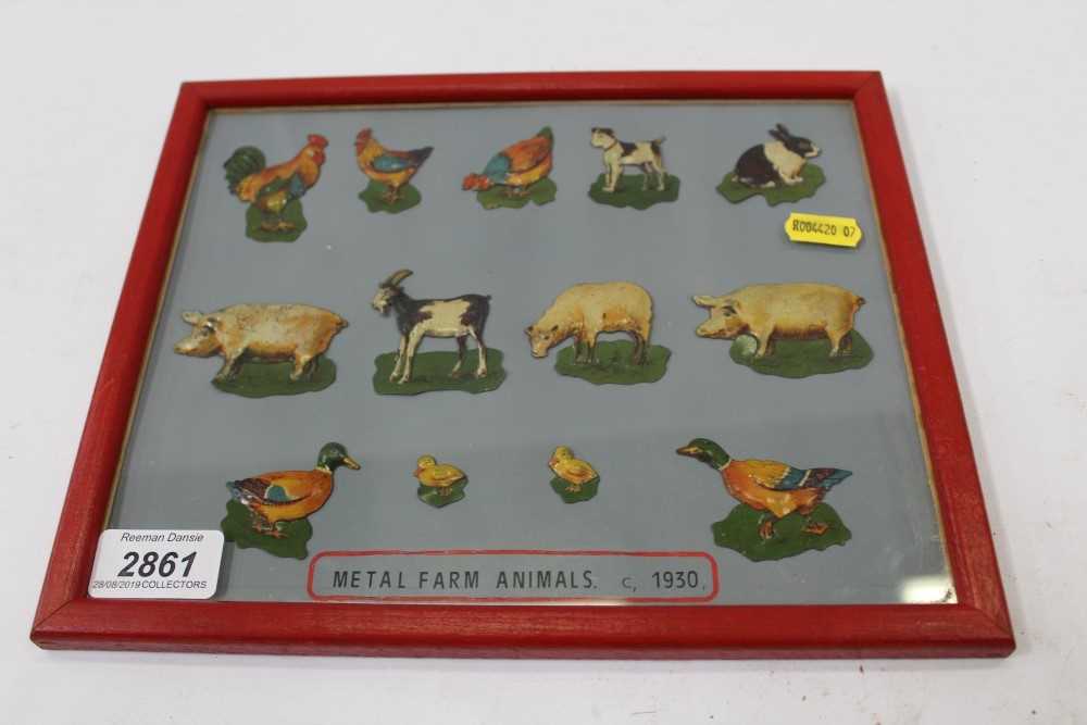 Lot 2861 Thirteen metal farm animals in frame