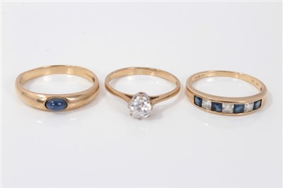 Lot 3364 - Three gold (9ct) gem set dress rings