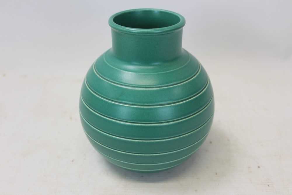Lot 2119 - Wedgwood Keith Murray green glazed vase 15.5cm high
