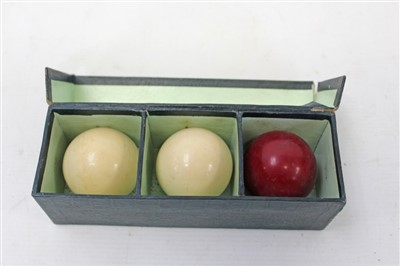 Lot 3634 - Three full-size ivory billiard balls in their original box