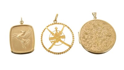 Lot 502 - 9ct gold circular locket, 9ct gold Pegasus pendant and a yellow metal Gurkha pendant (3)