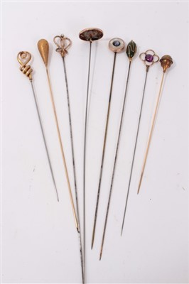 Lot 3369 - Edwardian gold 9ct hatpin and seven other yellow metal mounted hatpins