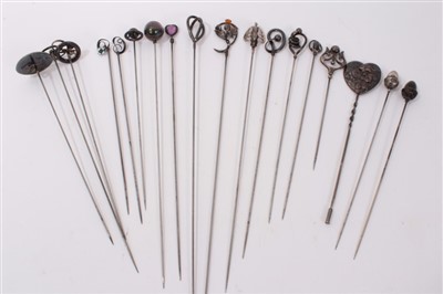 Lot 3378 - Eighteen Edwardian silver hatpins including Imperial Russian niellowork hatpin