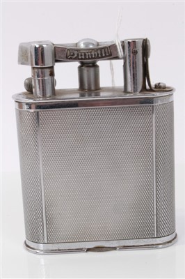 Lot 3657 - 1930s Dunhill chromium plated table lighter with all-over engine turned decoration, Patent 143752, 11cm high