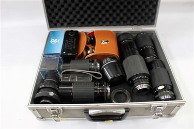 Lot 3694 - Quantity of interchangeable 35mm SLR lenses and other accessories, including six 200mm, two convertors, a Rodenstock enlarging lens and other items