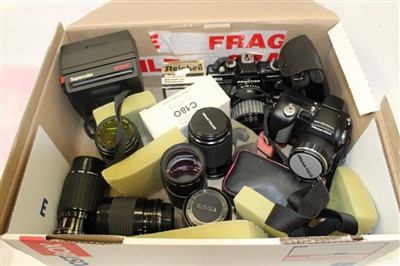 Lot 151 - Quantity of cameras, lenses and related items including a Praktica BM camera, various Praktica and Sigma lenses, a Polaroid 670AF and other items