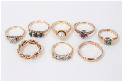 Lot 3359 - Eight gold and gem-set dress rings