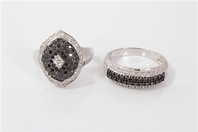 Lot 3386 - Two 14k white gold dress rings set with diamonds and gem stones