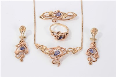 Lot 3360 - Suite of Welsh 14ct gold and tanzanite jewellery to include necklace, brooch, ring and pair of earrings, each with a Celtic design of trailing foliage.