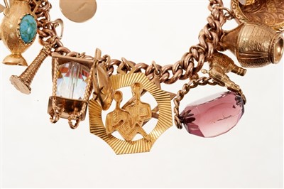 Lot 531 - Gold charm bracelet