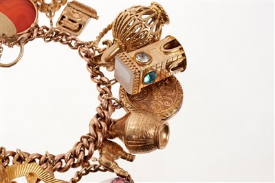 Lot 531 - Gold charm bracelet