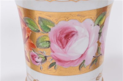 Lot 79 - Garniture of three early 19th Century vases of flared cylindrical form with polychrome painted floral band including pink roses on gilt ground, raised on paw feet comprising central vase 14cm high...