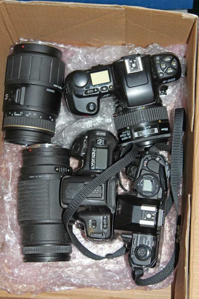 Lot 142 - Various 35mm SLR cameras and lenses