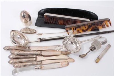 Lot 3706 - Mixed lot to include a Georgian silver punch ladle with whalebone handle, mid 18th century silver sugar tongs with acorn finial and maker’s mark ‘AA’, silver tea strainer, Victorian bullet shaped p...