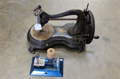 Lot 3728 - Cast Iron Sewing Machine together with a little Betty (2)