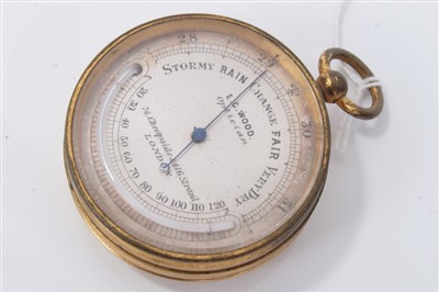 Lot 3756 - Late Victorian/Edwardian pocket barometer, the circular silvered dial signed E. G. Wood, London, in gilt metal case and original box