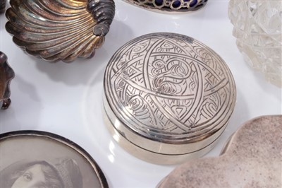 Lot 3708 - Two silver circular boxes, silver condiments, pair silver frames, white metal dog and sundry silver