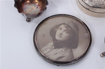 Lot 3708 - Two silver circular boxes, silver condiments, pair silver frames, white metal dog and sundry silver