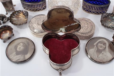 Lot 3708 - Two silver circular boxes, silver condiments, pair silver frames, white metal dog and sundry silver