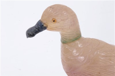Lot 3710 - Unusual carved hard stone figure of a duck with white metal webbed feet on wooden base 12cm