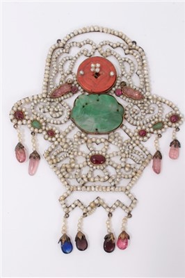 Lot 3404 - 19th Century Chinese seed pearl and gem set pendant plaque, the openwork panel with a central carved jade/green hard stone, carved coral and gem stones 13cm x 10cm