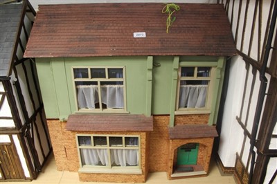 Lot 2873 - Three children's doll houses.