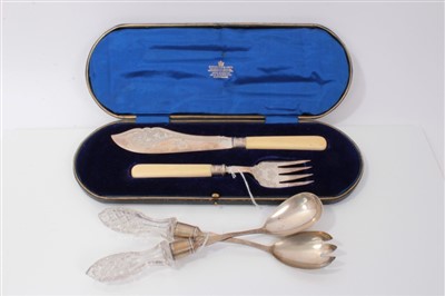 Lot 3798 - Silver fish servers with engraved foliate decoration, in original fitted case, together with a pair of silver salad servers with cut glass handles