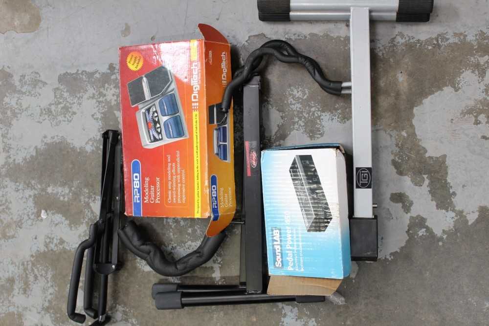 Lot 3829 - Digitec modelling guitar processor, boxed, together with other guitar accessories including Sound Lab pedal bank-pedal power 450, three various guitar stands