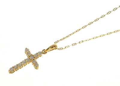 Lot 554 - Gold and diamond crucifix on chain