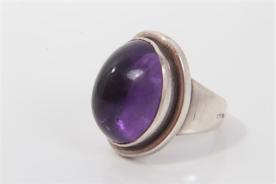 Lot 3438 - Georg Jensen Danish sterling silver ring mounted with purple cabochon stone