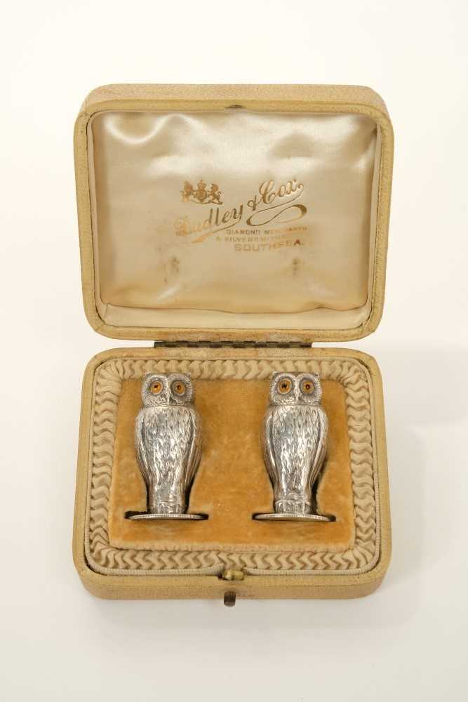 Lot 225 - Pair of silver novelty owl pepperettes by Sampson Morden, Chester 1912, cased
