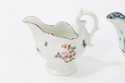 Lot 95 - Three 18th century Derby Dolphin ewer form cream jugs